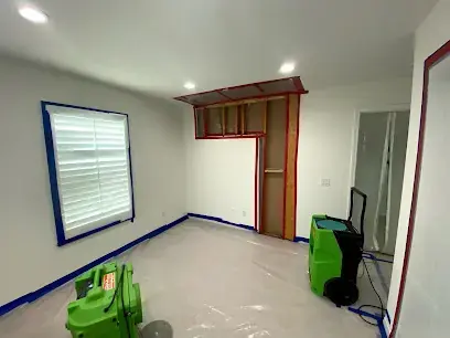 Drying equipment set up in a room during a La Habra water damage dry-out